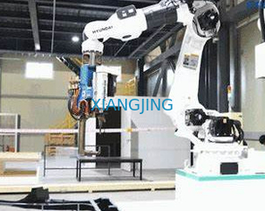 Kaynak Robotu Kolu 6 Eksenli Endüstriyel Manipülatör Hyundai HH10L Kaynakçı ve Kaynak meşalesi ile kaynak robotu